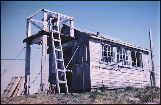 1951, the last year for the 1920 cabin. The windows stacked against the platform leg did not fit.