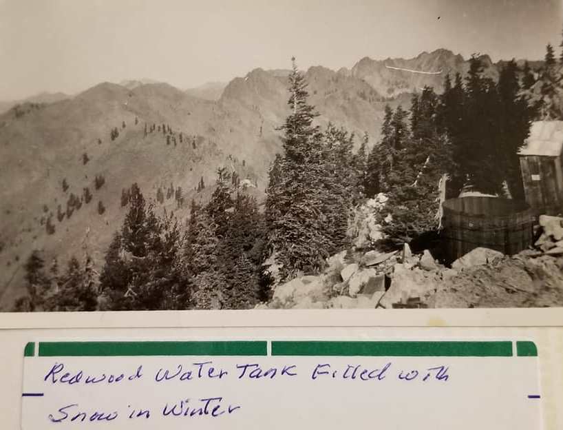 Outhouse and water cistern