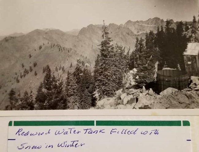 Outhouse and water cistern